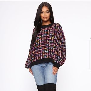 100% acrylic multi color sweater
